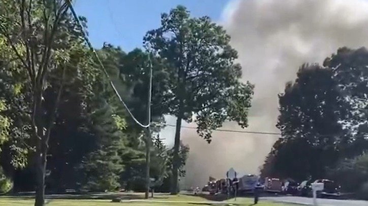 मिशिगन के चर्च में गोलीबारी के बाद आग लग गई. (Photo- Screengrab)